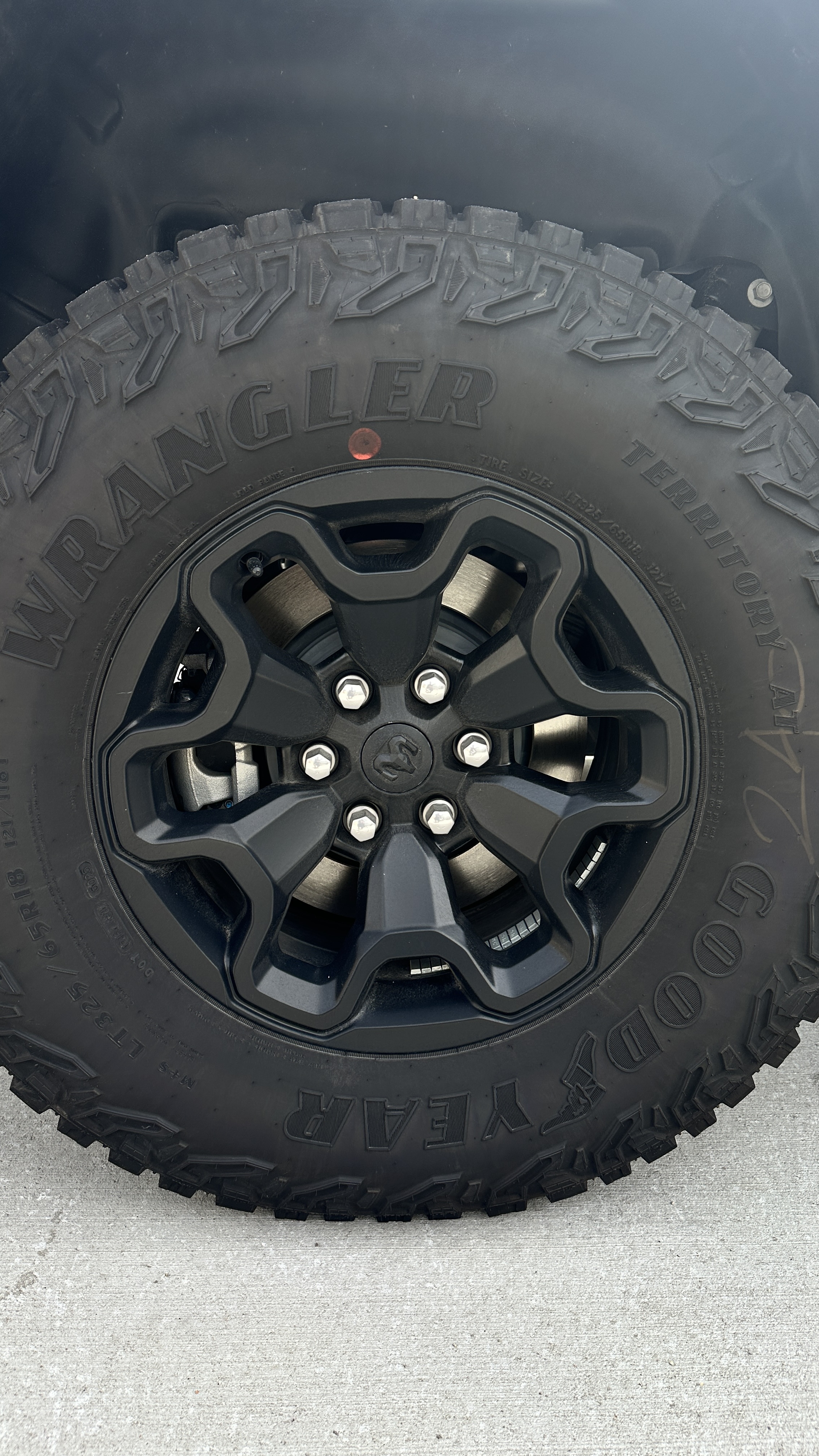 Before MattsCaps with chrome lug nuts visible